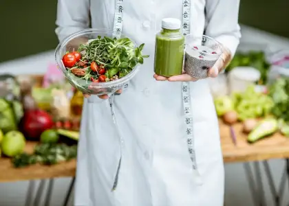 Nutritionist with healthy green food 2021 09 02 04 29 29 utc