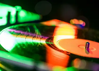 Close up view of sound mixer with vinyl in nightcl Y5 N5 J3 E