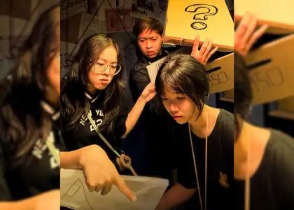 People solving puzzles in an escape room.