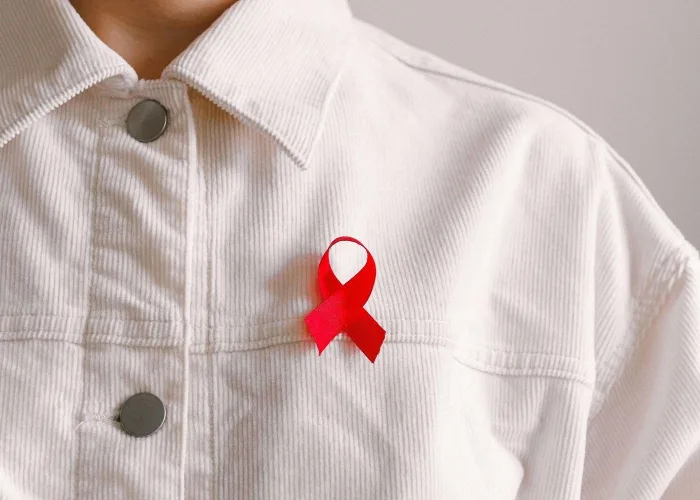 20251908 Man Wearing Red Ribbon