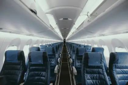 rows of empty airplane seats
