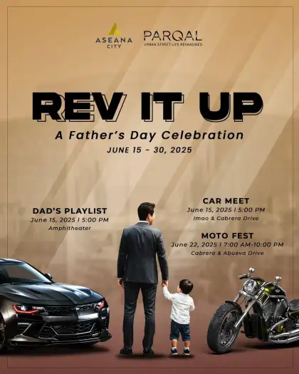 father and son holding hands with cars around them