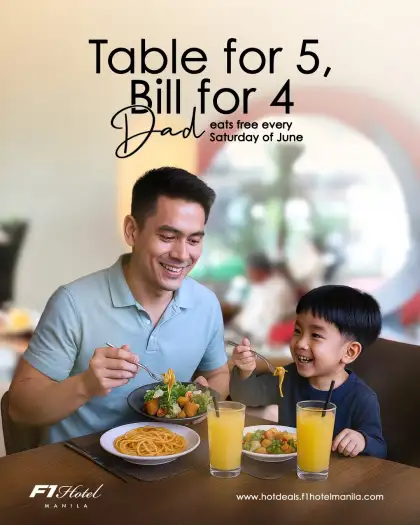 father and son in a dining table with foods and drinks in front of them