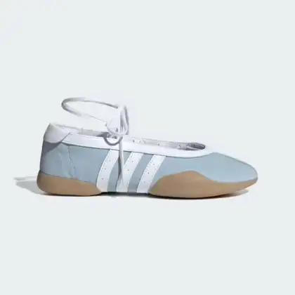 Light blue and white adidas Ballerina shoes displayed from the side, showcasing their sleek design and casual style.