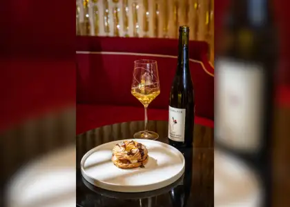 A white plate featuring Paris-Brest