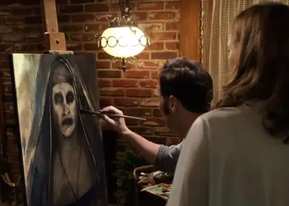 Patrick Wilson's Ed painting the evil nun in The Conjuring 2