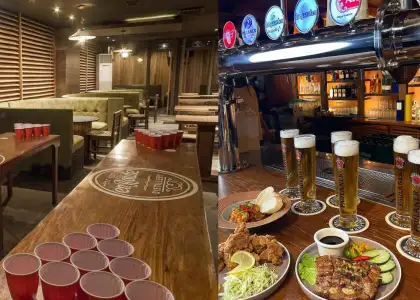 EnRoute QC's beer pong table and their food and tap beer