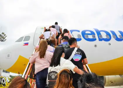Passengers boarding Cebu Pacific plane