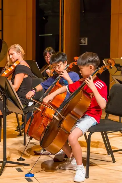 children playing string instruments