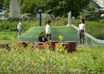 A New Community Space With Lush Greens Opens Along Rail Corridor